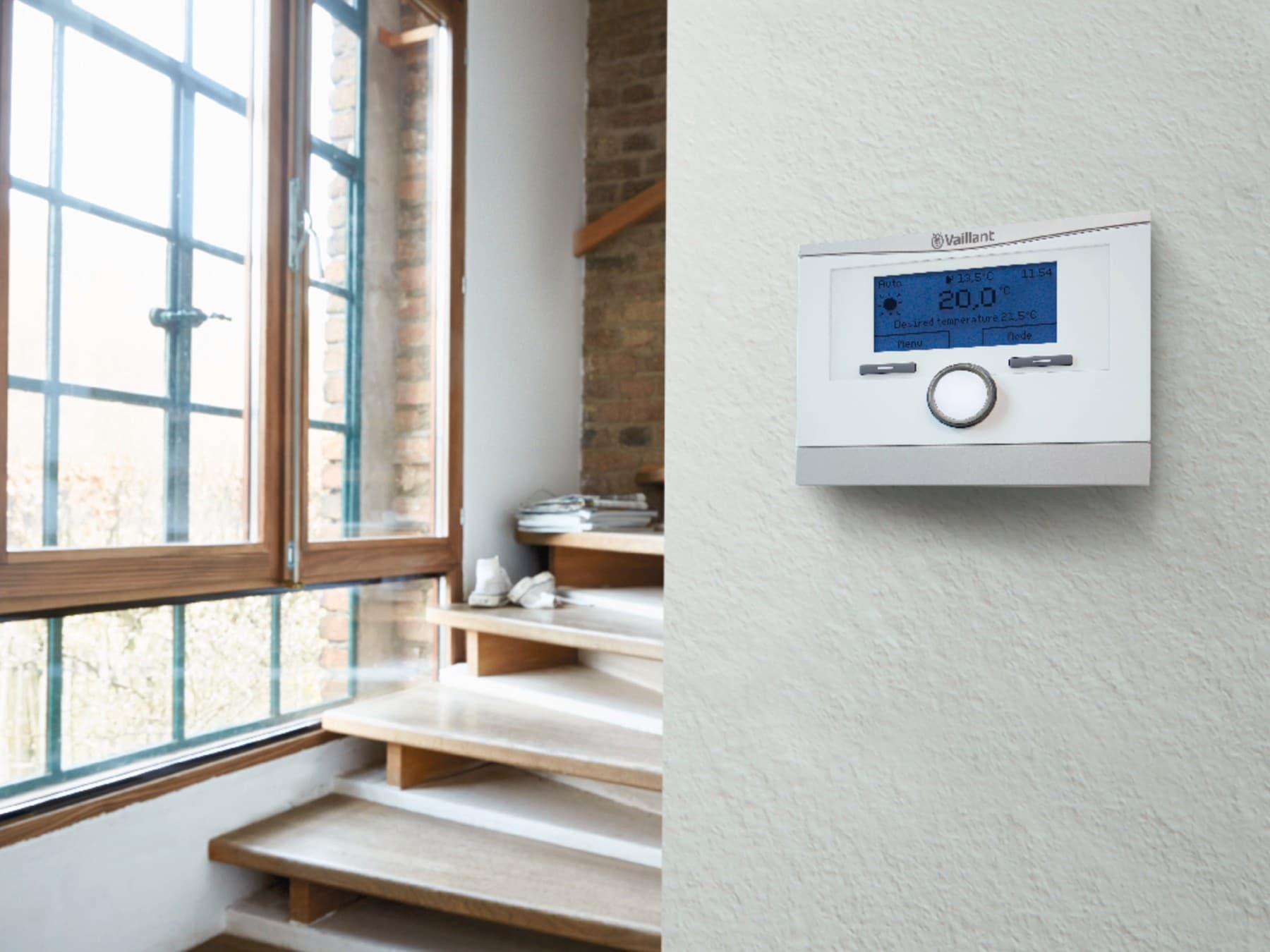 multiMATIC thermostaat aan een witte muur