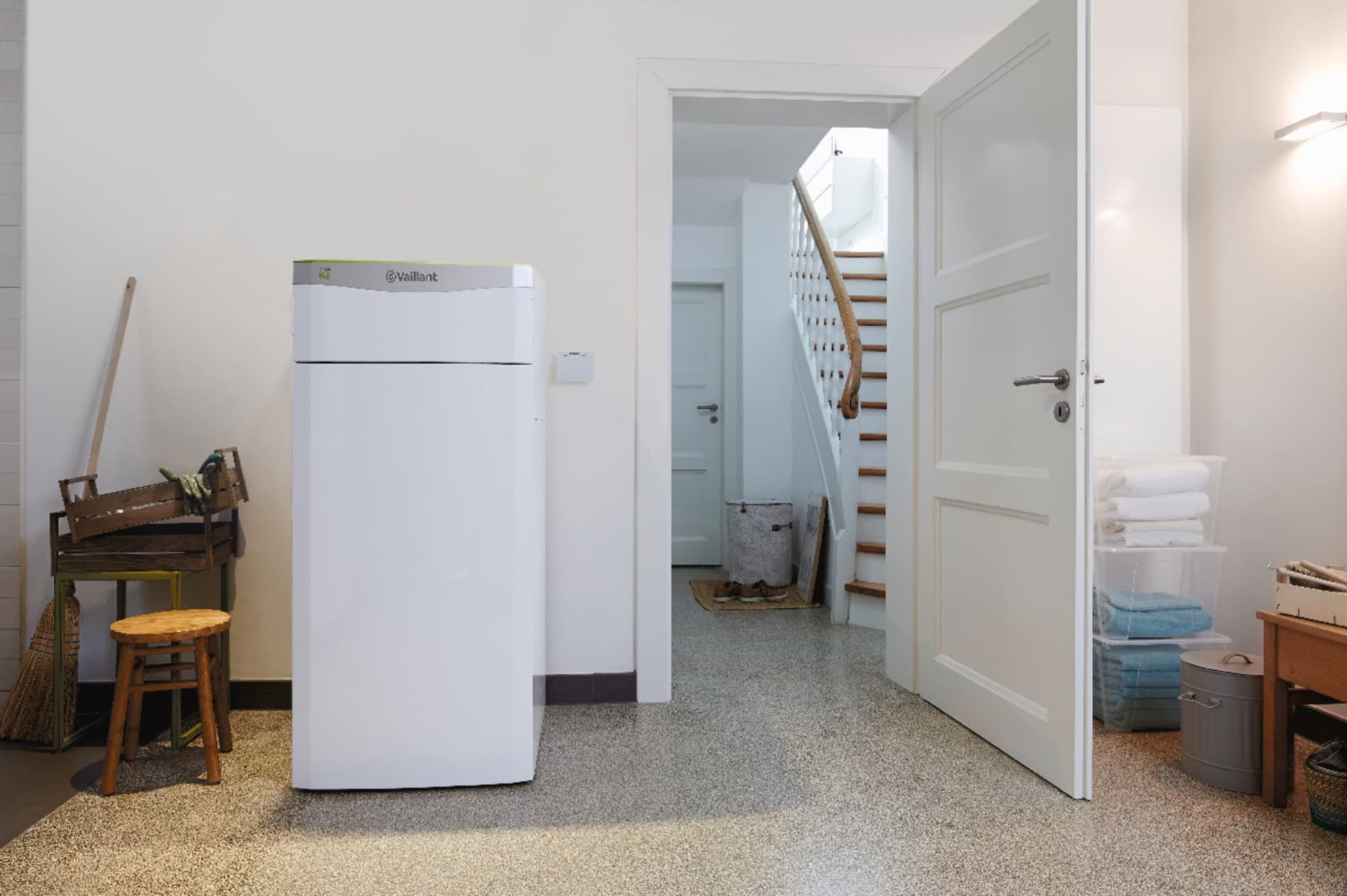 Een waterbronwarmtepomp in een bijkeuken
